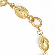 Bracciale unisex in oro giallo 18 carati con elementi ovali lavorati