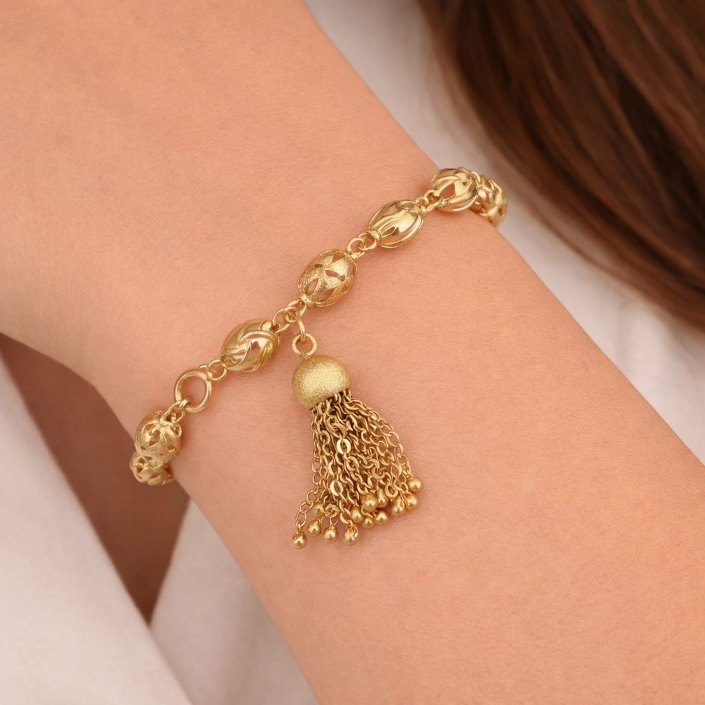Bracciale unisex in oro giallo 18 carati con elementi ovali lavorati