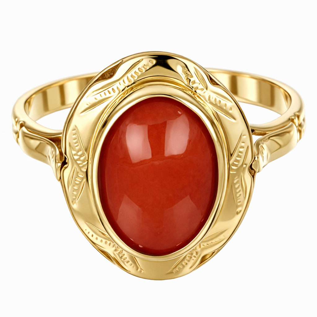 Anello da donna in oro giallo 18 carati con corallo centrale di forma ovale