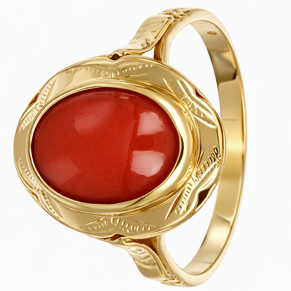 Anello da donna in oro giallo 18 carati con corallo centrale di forma ovale