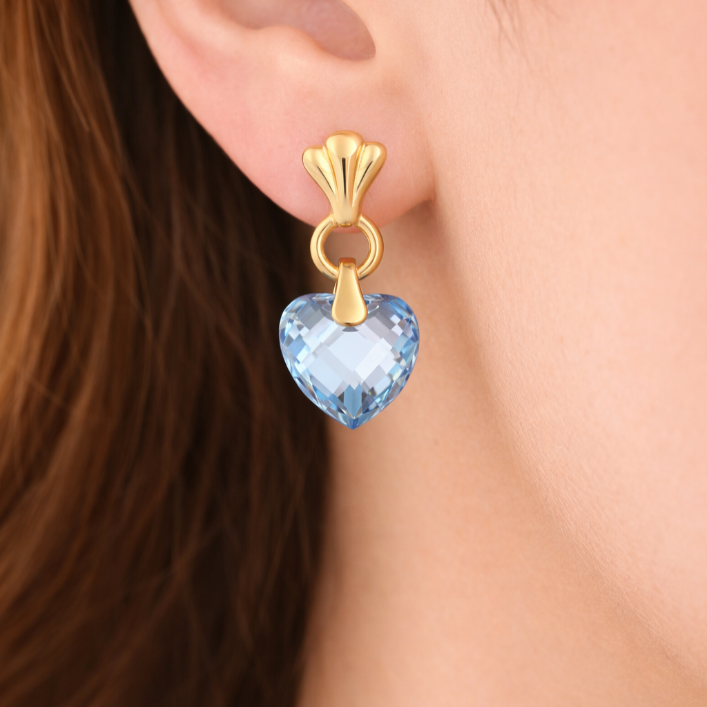 Coppia di orecchini pendenti da donna in oro giallo 18 carati con topazi