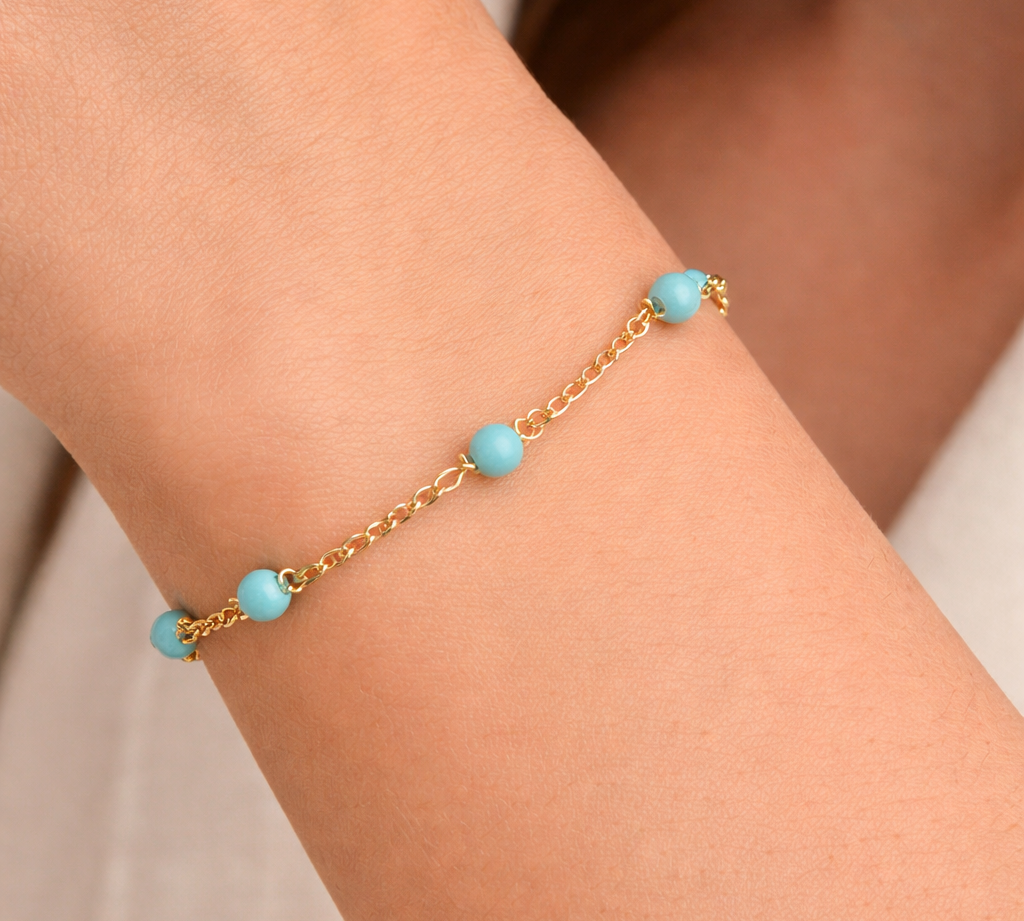 Elegantgoldandturquoisebracelet.png