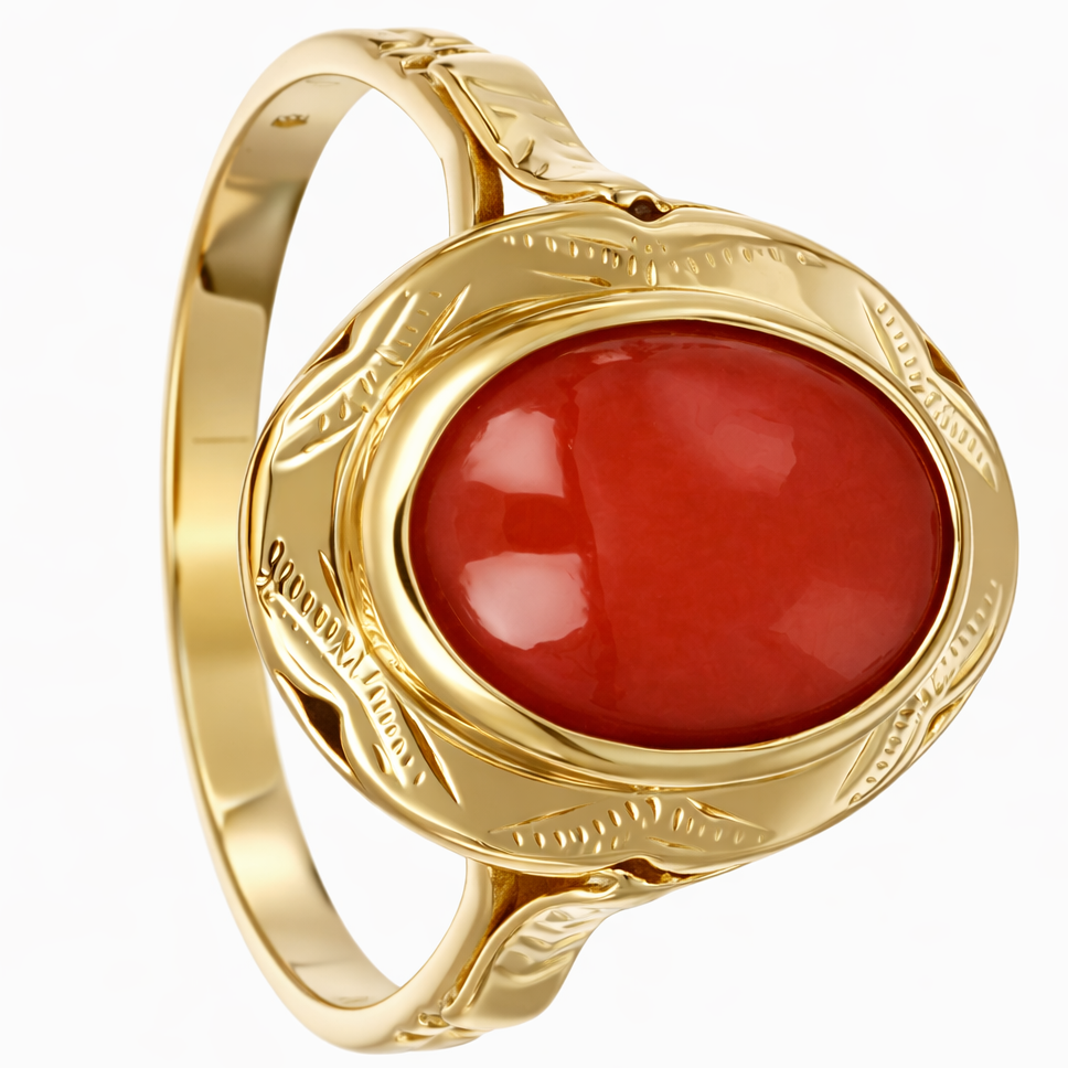 Anello da donna in oro giallo 18 carati con corallo centrale di forma ovale