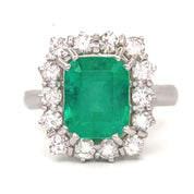 Anello in oro bianco 18 carati con n 1 Smeraldo da 3.50 Ct e n 14 Diamanti da 1.00 Ct tot