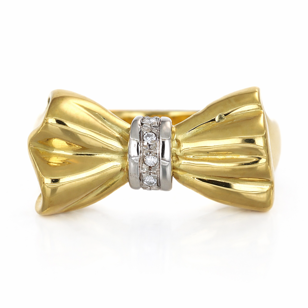 Anello da donna in oro giallo e oro bianco 18 carati con design a fiocco