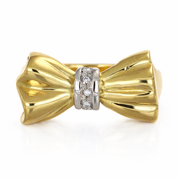 Anello da donna in oro giallo e oro bianco 18 carati con design a fiocco