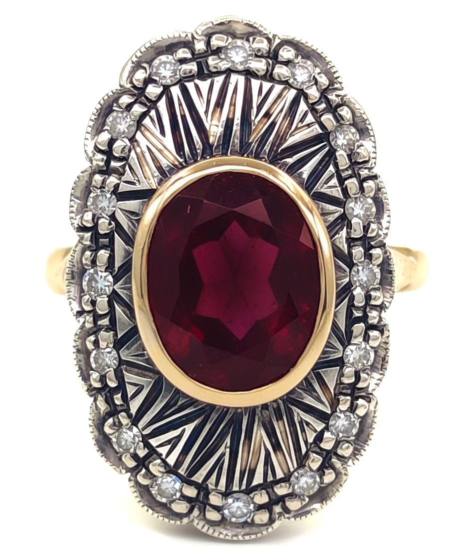 Anello in Oro giallo 18 carati e Argento 800 con Granato e Diamanti